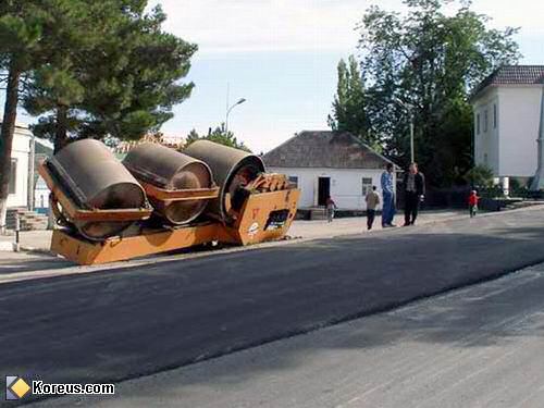 image rouleau compresseur retourne